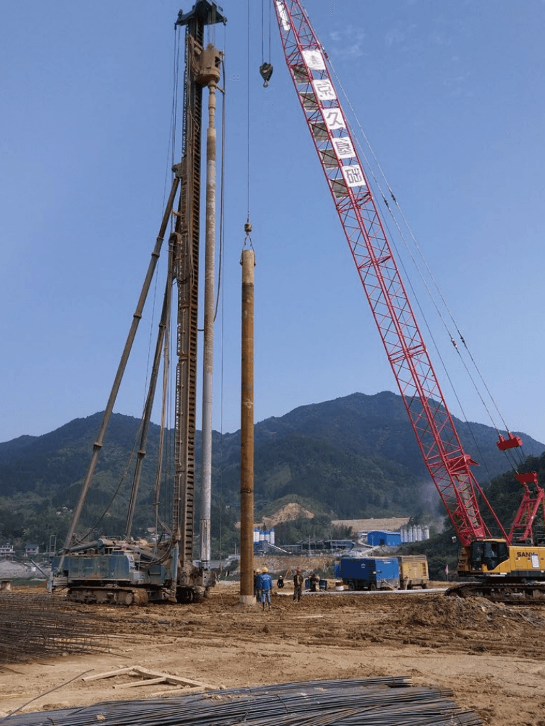 Large-diameter down-the-hole hammer bored pile construction
