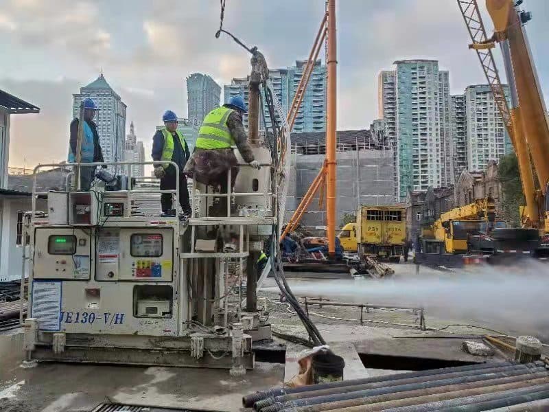 JOZO DJE130 series equipment deployed for jet-grouting and ground-improvement works at an urban construction site