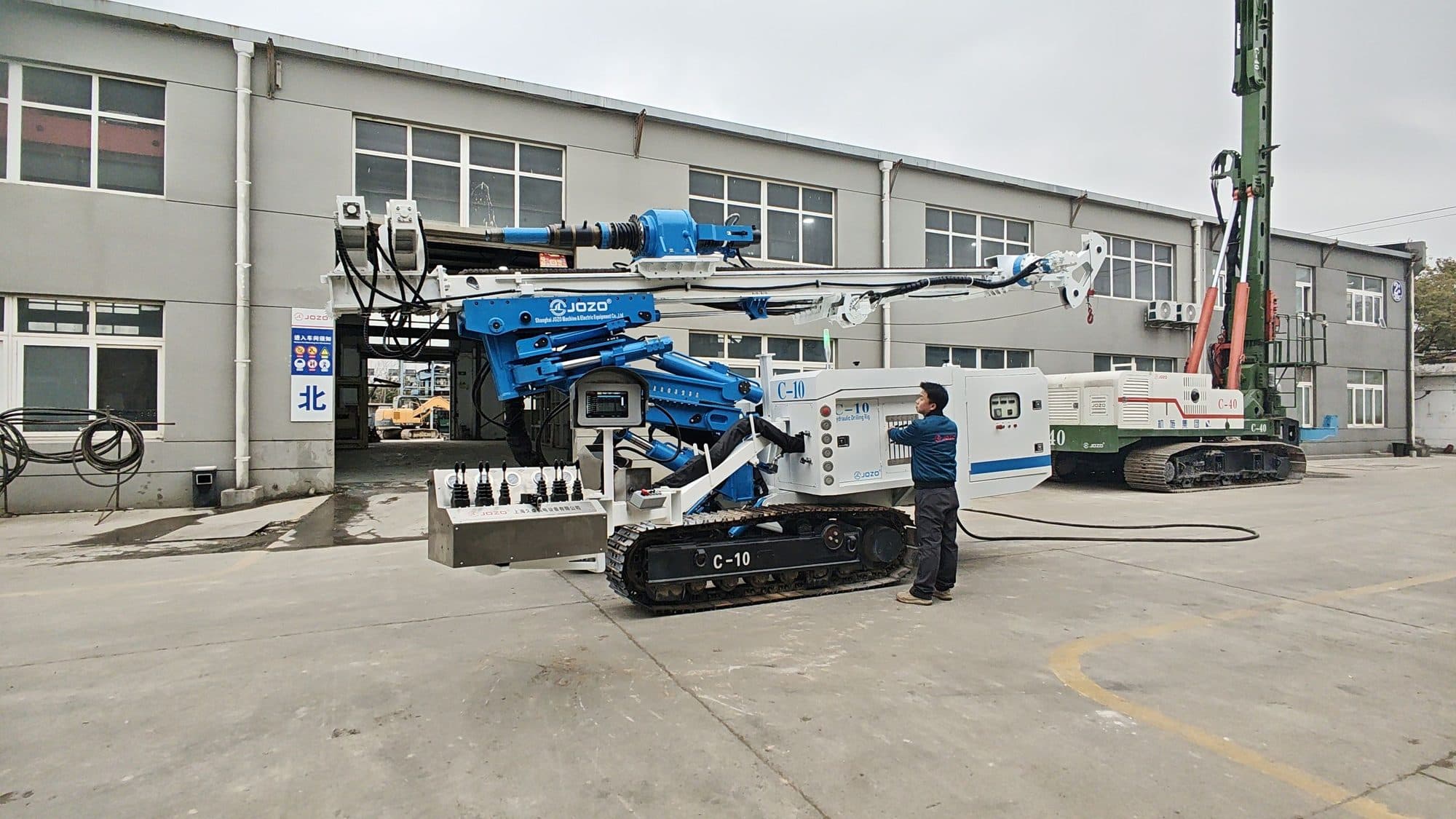 JOZO C-10 crawler drilling rig during factory commissioning and functional testing